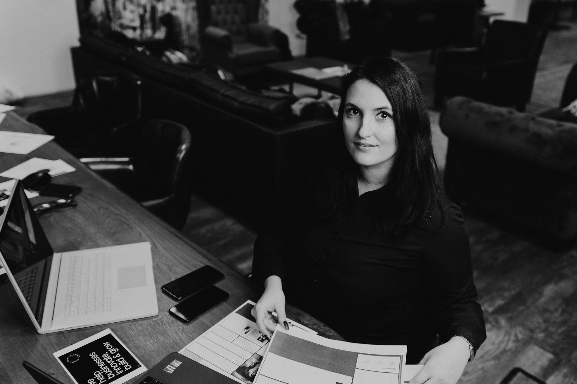 Reviewing printed page layouts at a desk